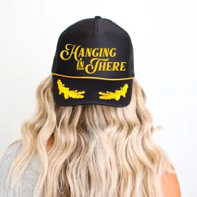 Hanging in There Black Captain's Trucker Hat